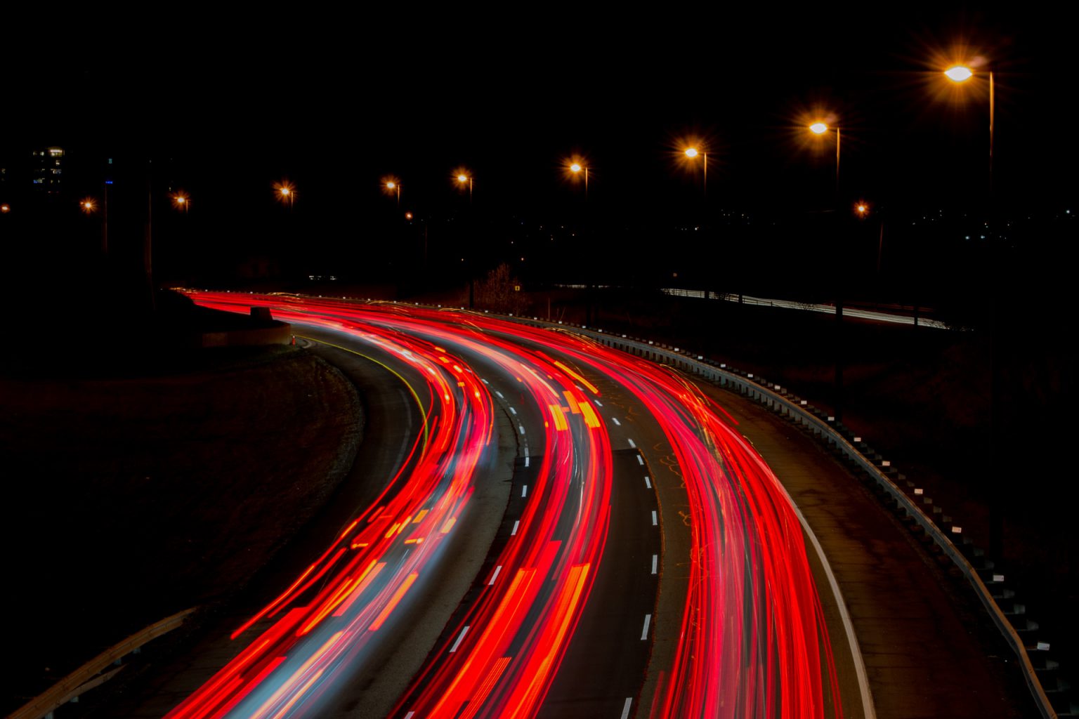 Blurry car lights on a highway at night